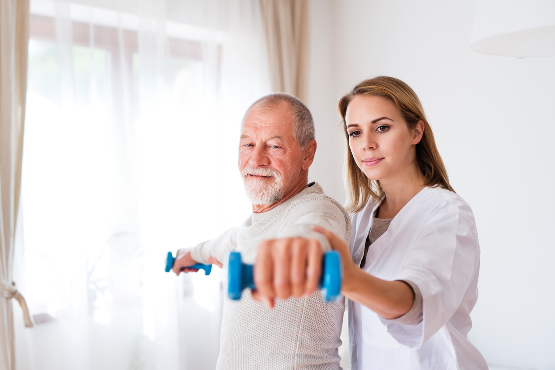 Health Visitor and Senior Man during Home Visit